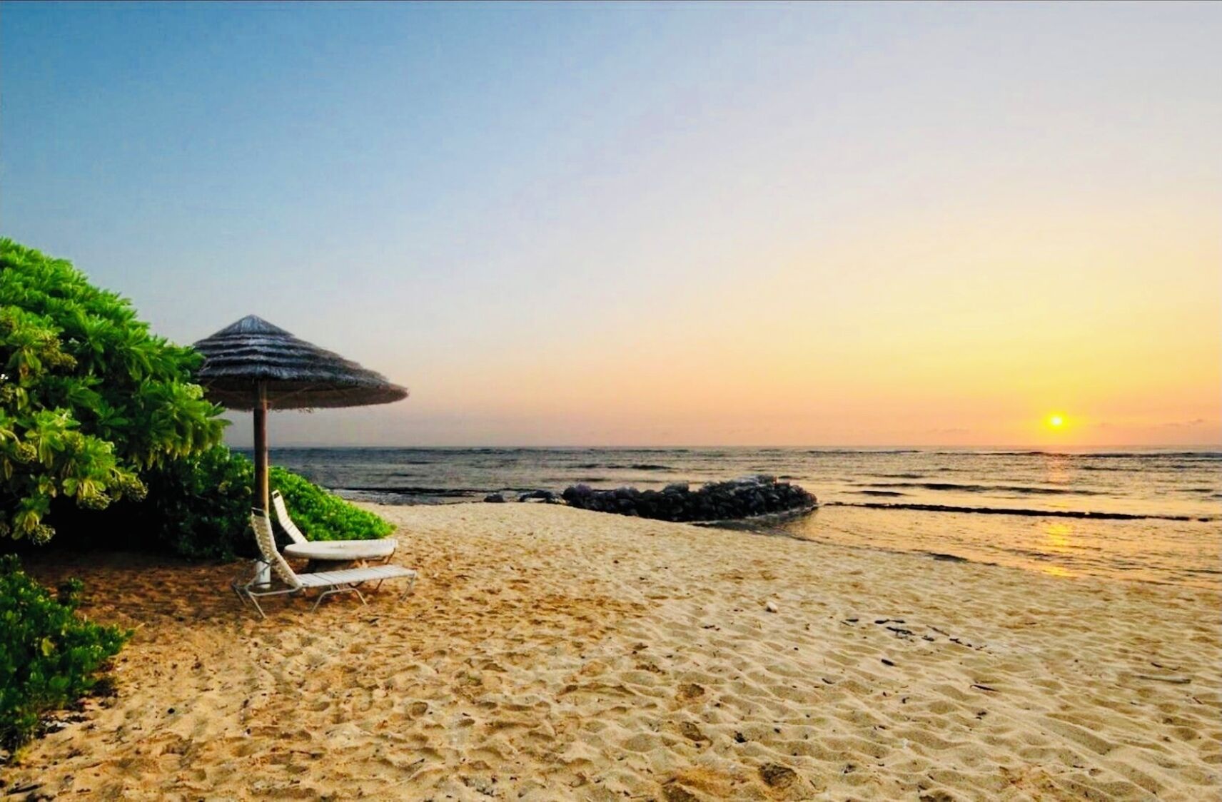 On the beach, sun loungers, beach towels