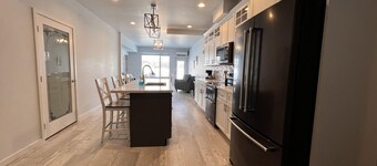 Modern Lakeside Condo: Scenic Views & Abundant Amenities Await