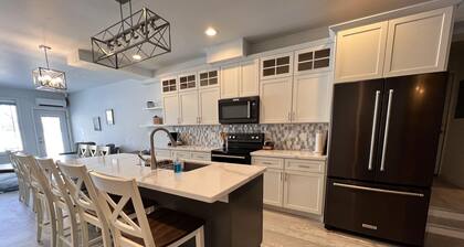 Modern Lakeside Condo: Scenic Views & Abundant Amenities Await