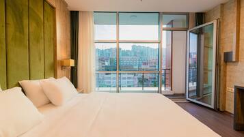 4 habitaciones, ropa de cama de alta calidad y minibar