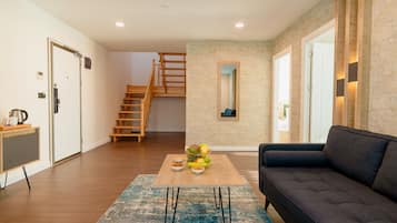 Premium Duplex | Living area | 55-inch LED TV with satellite channels, TV