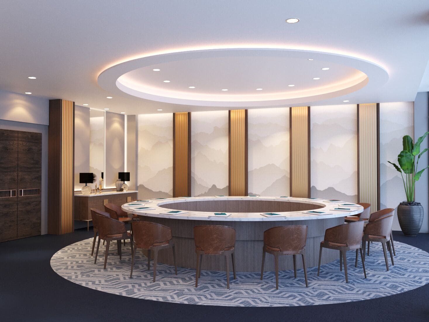 Una sala de conferencias moderna con una mesa circular, sillas y una pared decorativa con paneles verticales.
