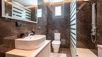 Shower, free toiletries, hair dryer, towels