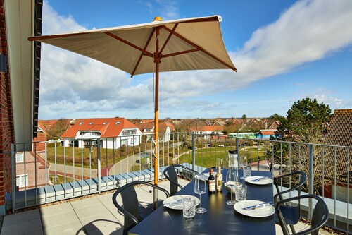 Traumferienwohnung mit 14 m² großem Balkon und Strandkorb auf der Insel Langeoog