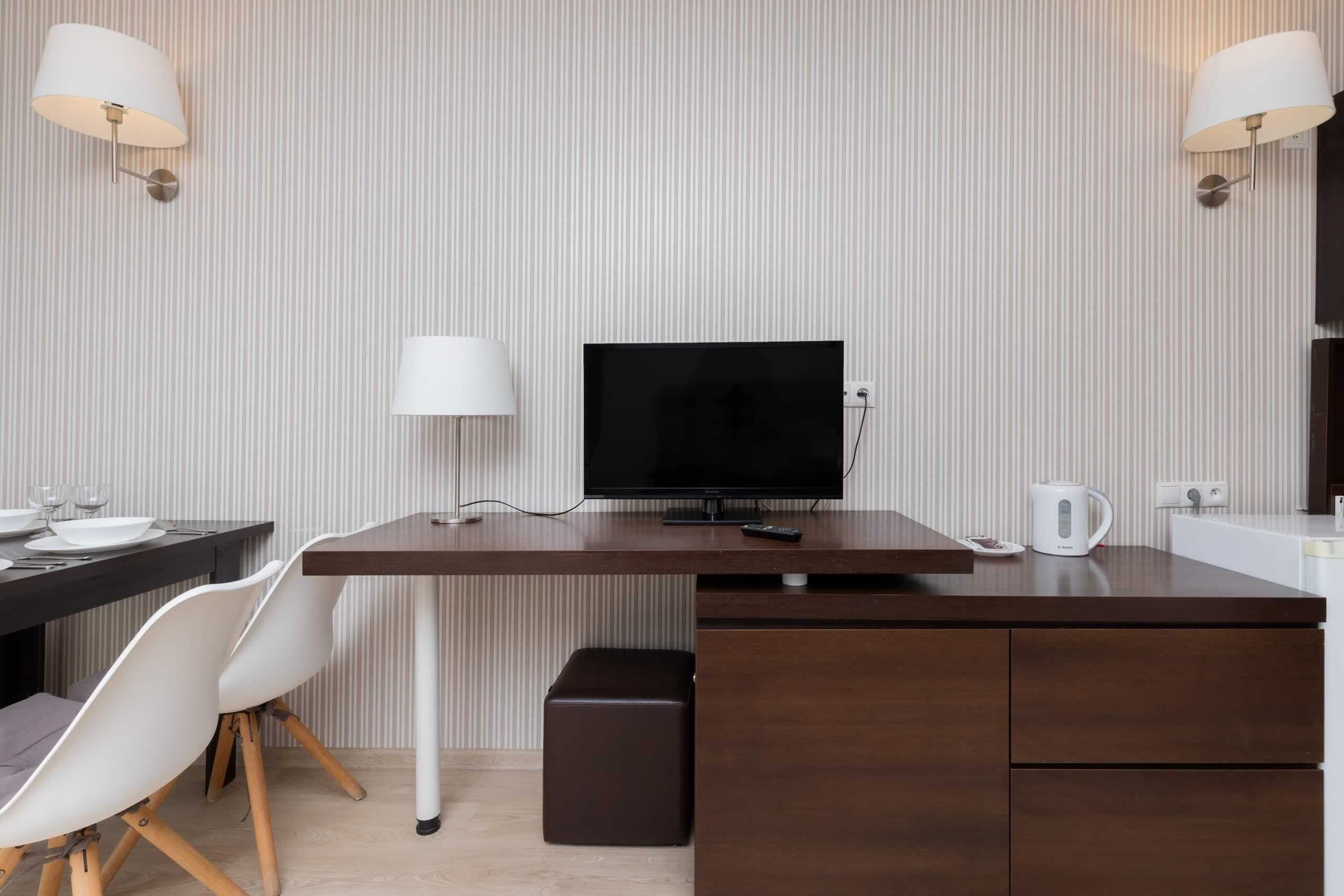 A desk and workspace area in the bedroom, blending functionality with modern design.
