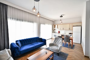 Familien-Suite | Zimmersafe, Bügeleisen/Bügelbrett, kostenloses WLAN, Bettwäsche