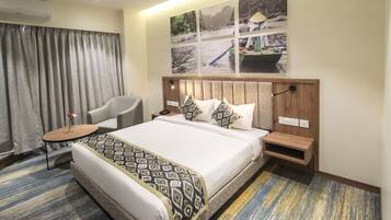 Deluxe Room | Iron/ironing board, free WiFi, bed sheets
