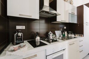 Fridge, oven, electric kettle, toaster