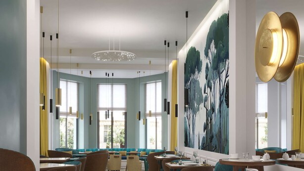 A modern dining area with high ceilings, pendant lighting, and a large mural on the wall. - Baron Amédée Armand Hotel & Spa Marseille - Mgallery (Marseille)