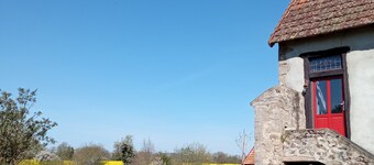 rural cottage with garden overlooking the swimming pond