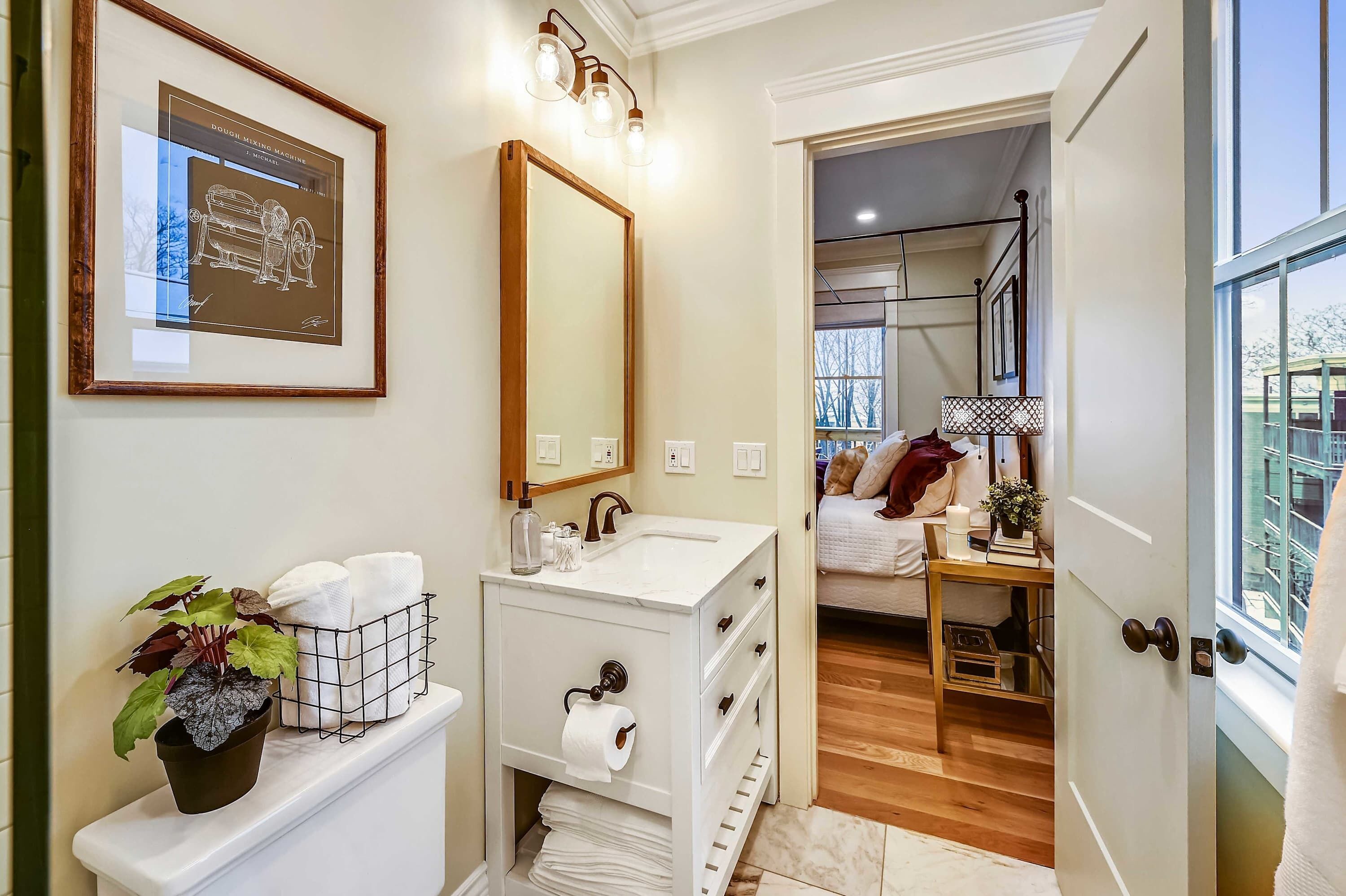 Bathtub, hair dryer, towels, shampoo