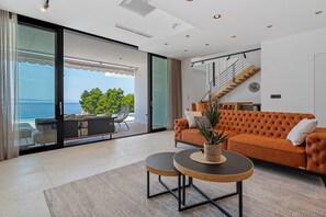 Flat-screen TV, video games, DVD player, stereo