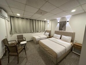 Chambre Triple Deluxe