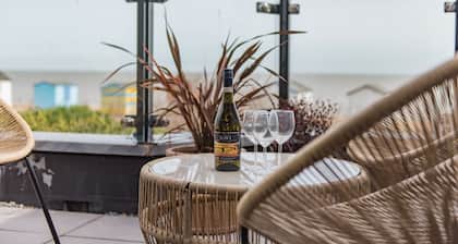 Stylish and spacious coastal retreat with sea views