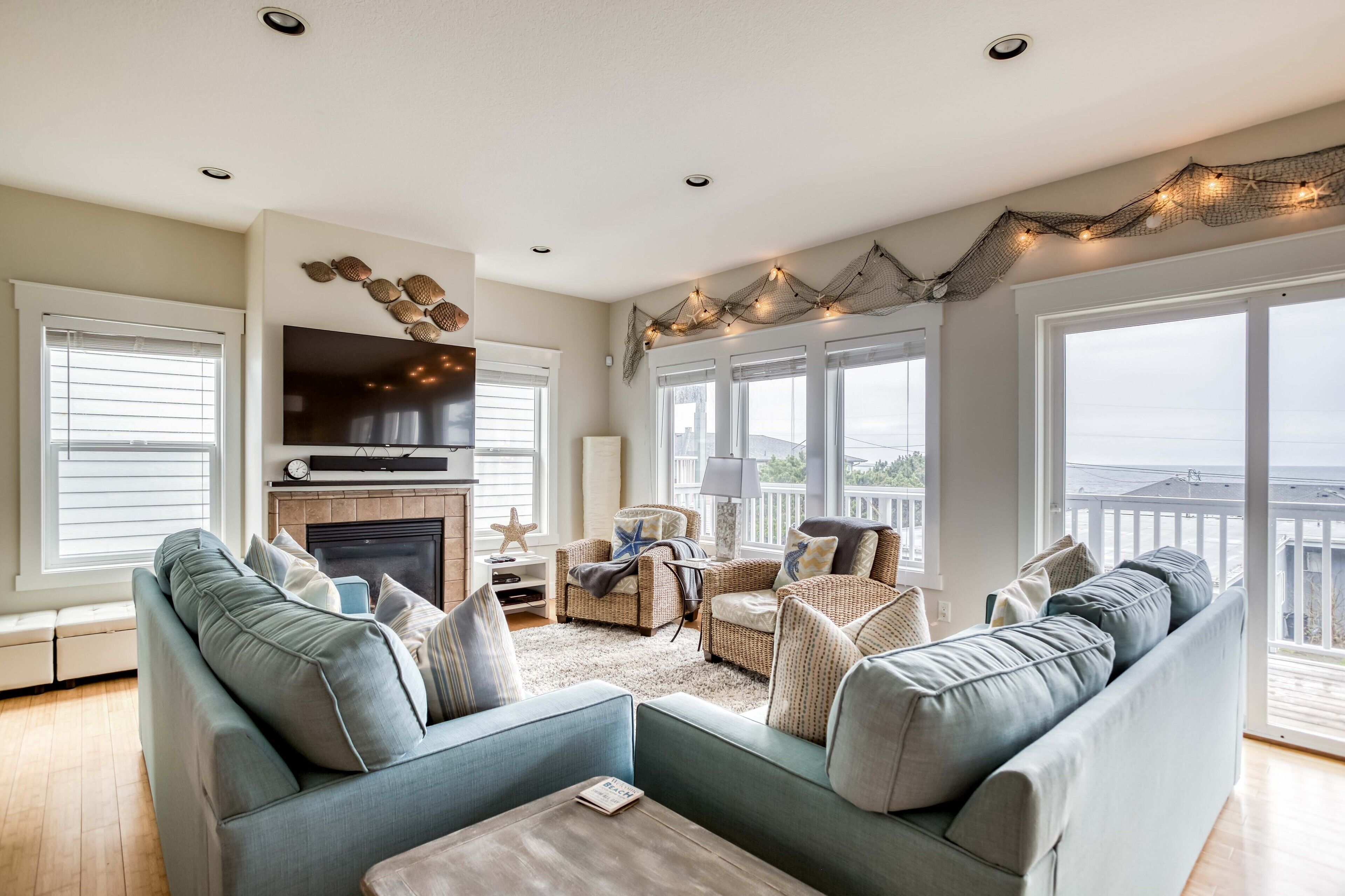 Stylish Home Near Beach has Ocean View Fireplace Suites, Fenced Yard, and Fire P