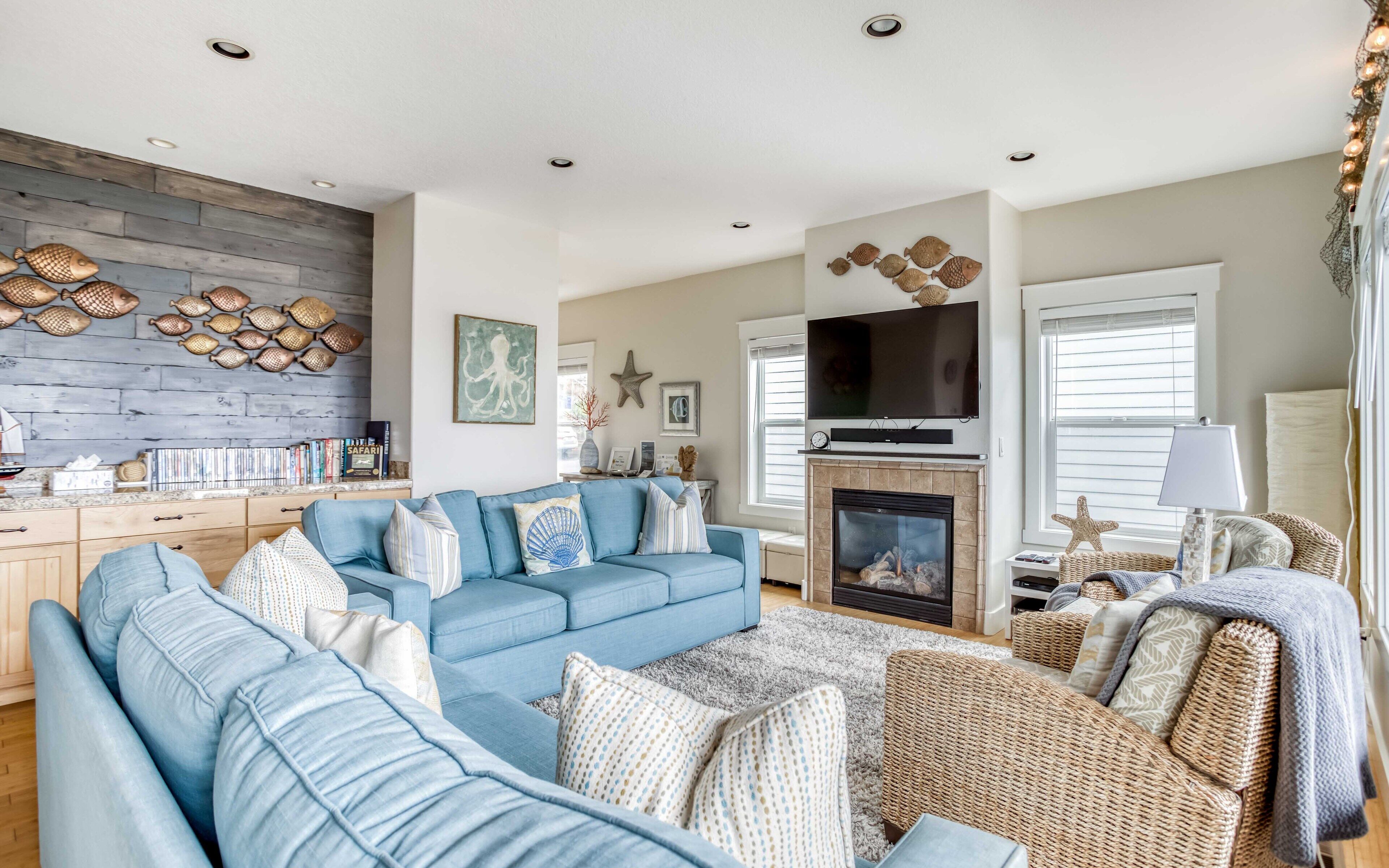 Stylish Home Near Beach has Ocean View Fireplace Suites, Fenced Yard, and Fire P
