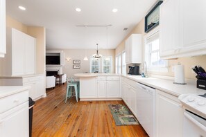Fridge, coffee/tea maker, cookware/dishes/utensils