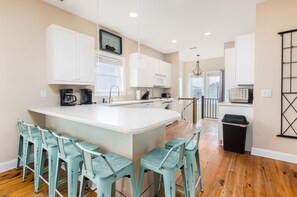 Fridge, coffee/tea maker, cookware/dishes/utensils