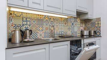 Studio, Kitchen | Private kitchenette | Dishwasher, cookware/dishes/utensils, freezer