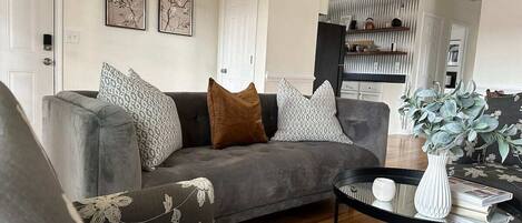 Smart TV, fireplace, books, stereo