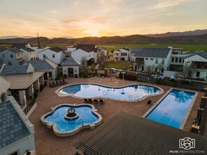 Relax by the serene pools and take in the breathtaking views of the surrounding mountains.