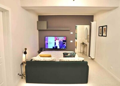 A comfortable home among the ancient arcades of downtown Modena