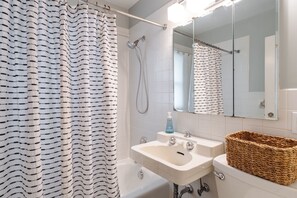 Hair dryer, towels, soap, shampoo