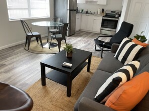 Standard Room | Living area | 55-inch TV with digital channels