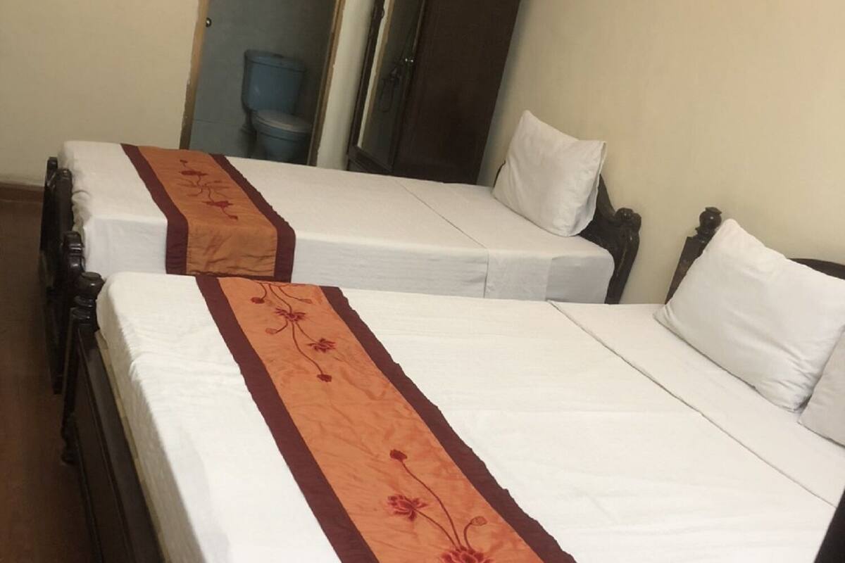 Family Room, City View | Soundproofing, WiFi (free), bed sheets