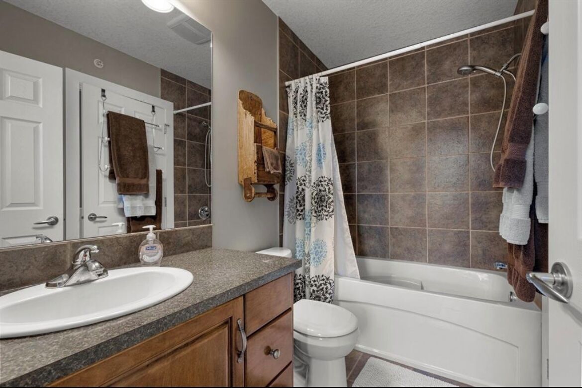 Spectacular Mountain Views! Unique & Rare End Unit 2 Storey Condo + 2 balconies!