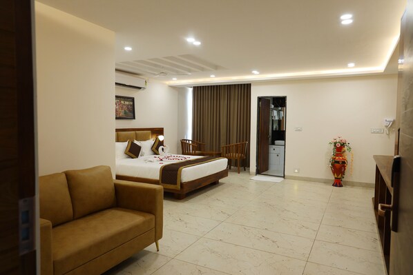 Royal Room | Living area | 32-inch LED TV with cable channels, TV - The Godavari Gokarna (Kumta)