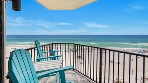 A balcony with a view of the beach and ocean. - 🏖️Stunning Gulf Views | 3 Pools | Sunbird 709W- Beach Life🏖️ (Panama City Beach)
