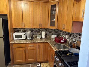 Fridge, microwave, oven, stovetop - First floor cozy apartment( on second level), Great place for any family . (Queens)
