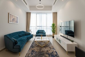 Living area - EXCLUSIVE, 1BR BEACH APARTMENT (Sharjah)