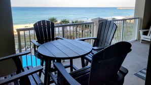 A balcony with a view of the beach and ocean. - Beachfront Bliss! 4th-Floor Condo 2BR/2BA Sleeps 8! Steps from the water! (Panama City Beach)