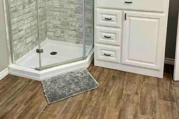 Shower, hair dryer, soap, shampoo