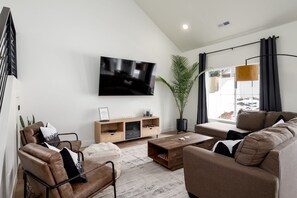 Smart TV, fireplace, books