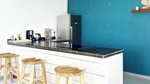 Comfort Suite | Private kitchen | Full-size fridge, microwave, stovetop, dishwasher