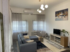 TV, books - The SNS Place (Three Bedroom Apartment in East Legon Hills, Accra) (Greater Accra Region)