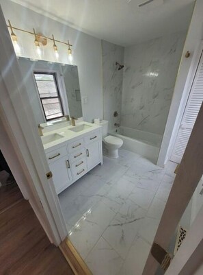 Hair dryer, towels, soap, shampoo