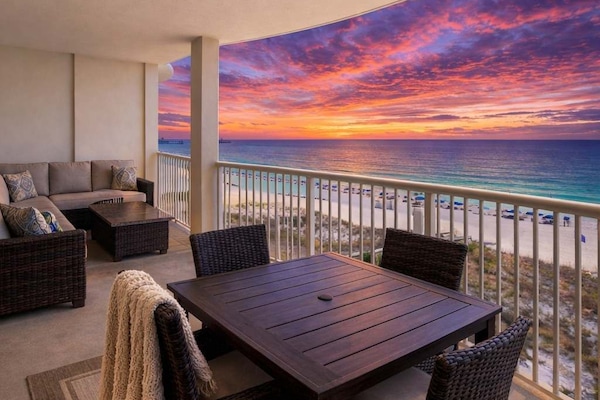 Private beachfront balcony with panoramic Gulf views and space to dine or relax just steps from the sand