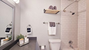 Hair dryer, towels, soap, shampoo