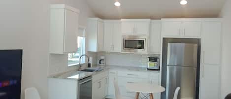 Fridge, microwave, dishwasher, coffee/tea maker