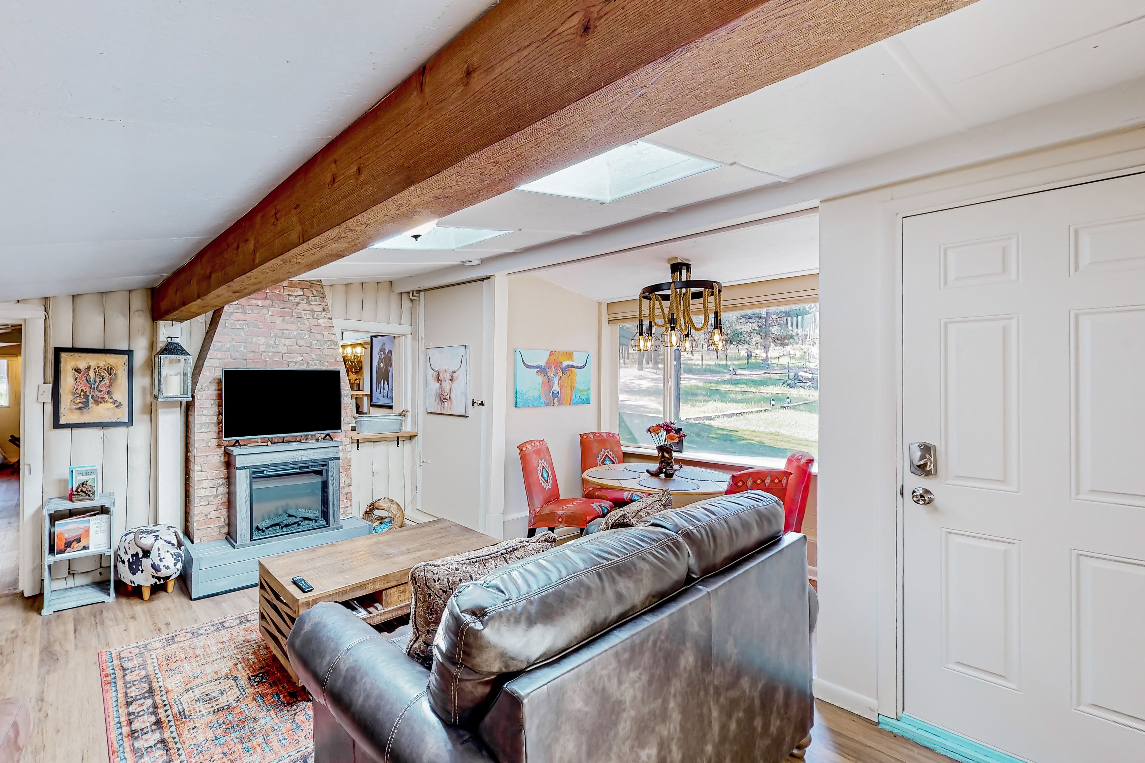 Charming home on 14 acres near town with patios, fire table, & 3 fireplaces