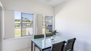 Dining - This smartly presented north facing unit is your perfect holiday property for a one night or one mon (YAMBA)