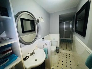 Shower, hair dryer, towels, soap