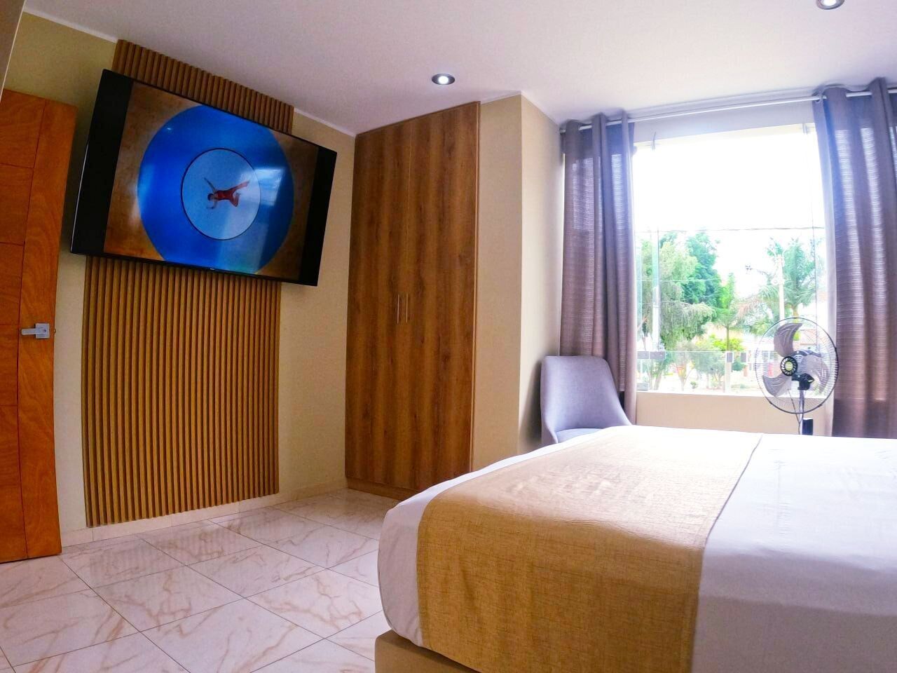 Kamar Double Eksklusif, 1 Tempat Tidur Queen, pemandangan kebun | Seprai premium, selimut bulu angsa, dan busa memori