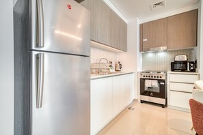 Fridge, microwave, coffee/tea maker, electric kettle - Captivating 1BR at 17 Icon Bay Dubai Creek Harbour by Deluxe Holiday Homes (Dubai)