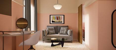 Una sala de estar moderna con un sofá, una mesa de centro y una silla.