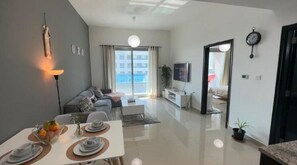 Living area - Himalaya Homes Lovely 1 Bedroom Apartment (Dubai)